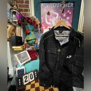 Vtg a black and green Kawasaki motorcycle jacket.